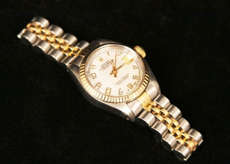 Lady Rolex Two-Tone DateJust Wristwatch SBARTH1: "Lady Rolex Two-Tone DateJust Wristwatch SBARTH1. Good condition! GH1071TN. One ladies, hand crafted and machine milled Rolex DateJust Model Stainless Steel and 14KT yellow gold wristwatch electronica