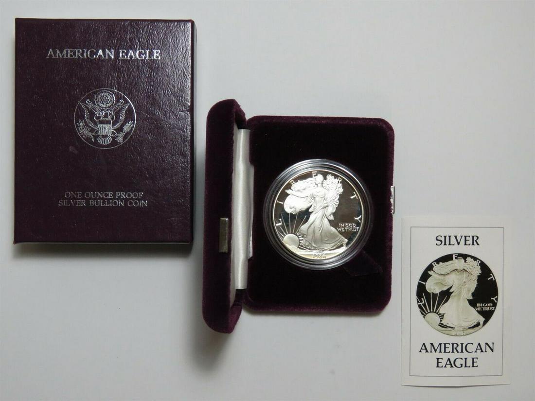 1986-S $1 American Silver Eagle Dollar Proof Coin w/Case & COA: One 1986-S $1 American Silver Eagle Dollar Proof Coin w/Case & COA. The outter box has some wear.