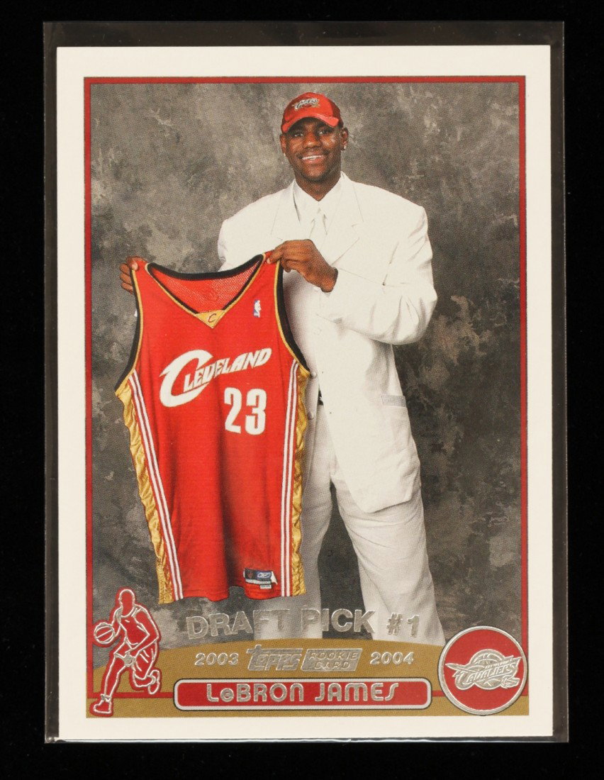 2003 Topps LeBron James Rookie Card C259: "2003 Topps LeBron James Rookie Card C259. As-Is Condition! MW83LO. One 2003 Topps LeBron James Rookie Card #221. Team: Cleveland Cavaliers. Thank you for viewing this lot. We are always adding new in