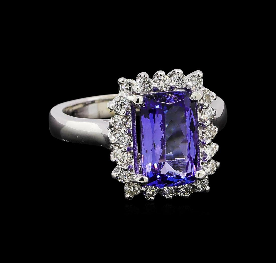 3.25 ctw Tanzanite and Diamond Ring - 14KT White Gold: One ring : 14KT white gold weighing 6.00gm containing one tanzanite stone with a total weight of 3.25ct. and diamonds weighing 0.42ctw.