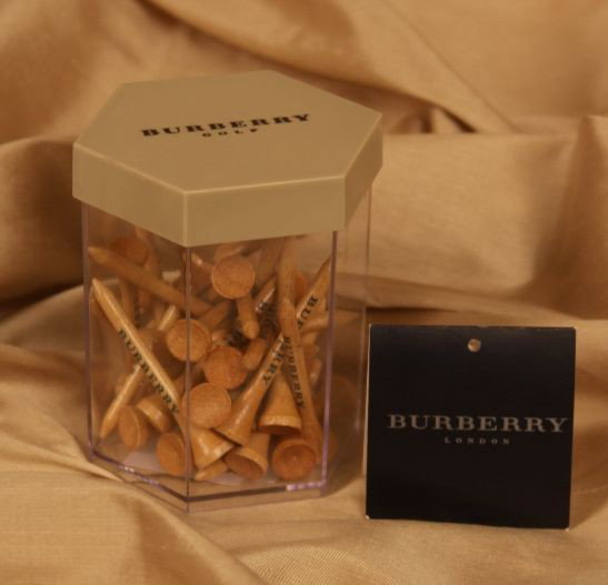 Brand New Burberry Golf Tees ED583: "Brand New Burberry Golf Tees ED583. Excellent Condition! VQ11XZ. New Burberry London golf tees in Burberry London logo jar. Container measures 3-1/2" tall x 3-1/4" wide. Thirty embossed Burberry wood