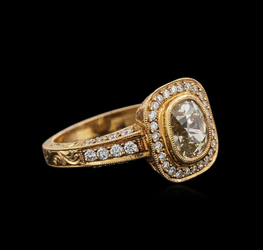18KT Rose Gold 1.83 ctw Diamond Ring: One electronically tested 14-18KT rose gold ladies cast diamond engagement ring with a bright polish finish. Identified with markings of "18K". Condition is new. Containing: One bezel set old mine cut