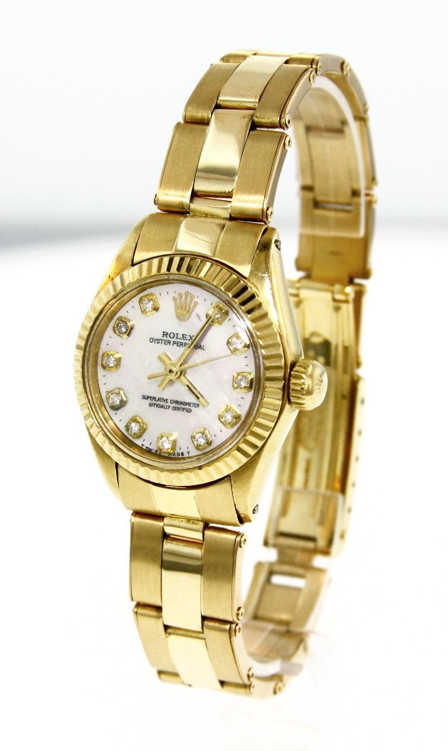 Ladies 18KT Gold Rolex Oyster Perpetual Wristwatch A312: "Ladies 18KT Gold Rolex Oyster Perpetual Wristwatch A3120. Good Condition! YF1004NE. One ladies, hand crafted & machine milled Rolex Oyster Perpetual model wristwatch electonically tested 18KT yellow 