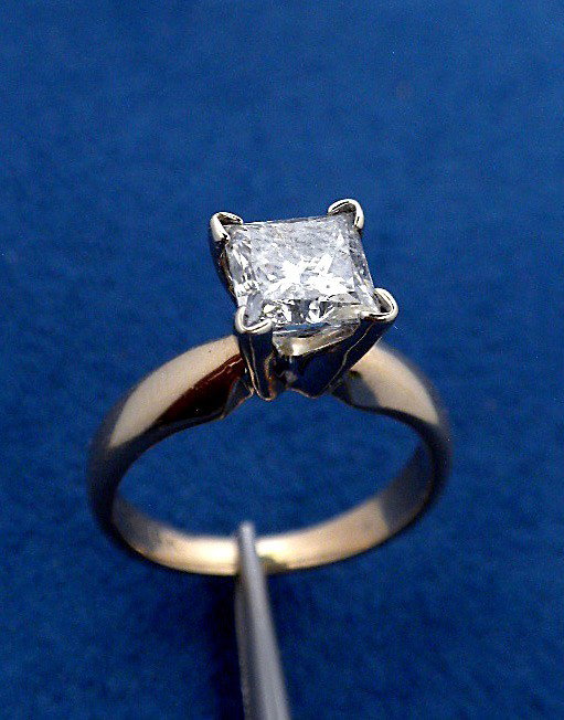 14KT Yellow Gold 1.15ct Diamond Solitaire Ring A3228: "14KT Yellow Gold 1.15ct Diamond Solitaire Ring A3228. Good Condition! ST6801WQ. One electronically tested 14KT yellow gold ladies cast diamond solitaire ring. The diamond solitaire is completed by a 