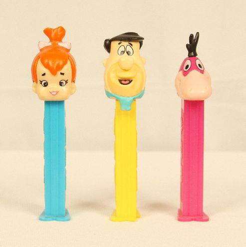 Lot of 3 Flintstones PEZ Dispensers ED938: "Lot of 3 Flintstones PEZ Dispensers ED938. Excellent Vintage Condition! MS3FW. Lot of 3 Flintstones PEZ dispensers. Included are "Fred", "Pebbles" and "Dino", introduced in 1993. Come loose and ready