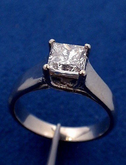 14KT White Gold 1.23ct Diamond Solitaire Ring A3223: "14KT White Gold 1.23ct Diamond Solitaire Ring A3223. Good Condition! MK4121SF. One electronically tested 14KT white gold ladies cast diamond solitaire ring with a bright polish finish. Total weight o