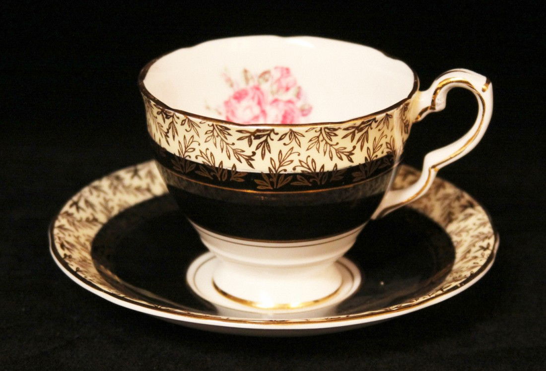 Royal Stafford China Stunning Black and Gold Leafed wit: Royal Stafford China Stunning Black and Gold Leafed with Flowers BD166. Excellent Vintage Condition! LN63VM. This magnificent bone china from Royal Stafford tea cup and saucer set has a stunning desig