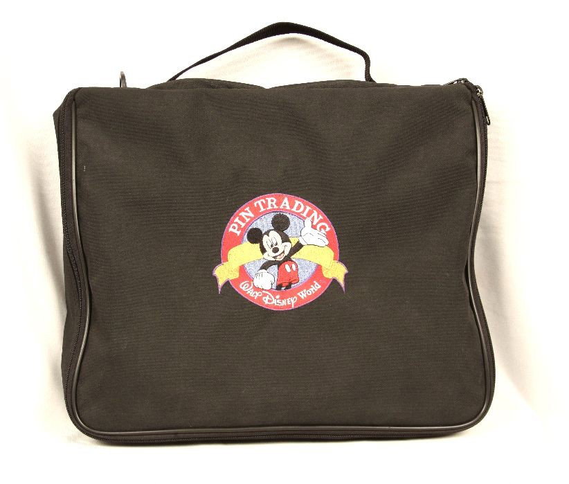 Walt Disney World Large Pin Trading Bag NS144: Walt Disney World Large Pin Trading Bag NS144. Excellent Condition! SLKA. Display your Disney Pin Collection in this Disney's Pin Trading Bag. Mickey Mouse is prominently featured with the Disney's Pi
