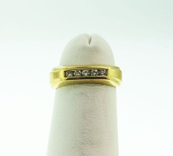 14T Yellow Gold Diamond Ring .5ct GD93: "14T Yellow Gold Diamond Ring .5ct GD93. Good Condition! SE69GN. One 14KT yellow gold diamond ring weighing 3.2g. The ring features a row of five diamonds and is identified with markings of "RL". Tota