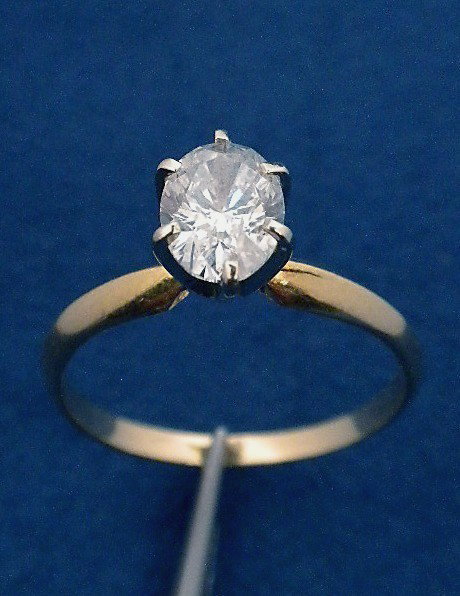 14KT Yellow Gold 1.05 Diamond Solitaire Ring A3222: "14KT Yellow Gold 1.05 Diamond Solitaire Ring A3222. Good Condition! TW4811GT. One electronically tested 14KT yellow gold ladies cast and assembled diamond solitaire ring. The solitaire ring features 
