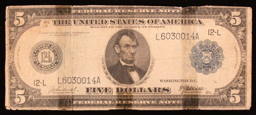 1914 $5 Blue Seal FRN San Francisco Burke/McAdoo PM2018: "1914 $5 Blue Seal FRN San Francisco Burke/McAdoo PM2018. As-Is Condition! BL63FE. 1914 $5 Blue Seal Federal Reserve Note San Francisco Burke/McAdoo. Thank you for viewing this lot. We are always addi