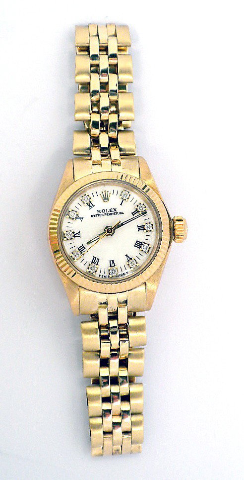 Vintage Yellow Gold Rolex Oyster Perpetual Wristwatch A: "Vintage Yellow Gold Rolex Oyster Perpetual Wristwatch A3322. Great Condition! ER6682FC. One ladies, hand crafted and machine milled Vintage Rolex Oyster Perpetual, model wristwatch electronically tes