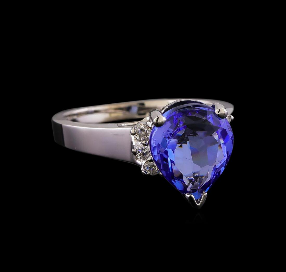 3.86 ctw Tanzanite and Diamond Ring - 14KT White Gold: One ring featuring: 14KT white gold weighing 5.16 grams containing one Tanzanite with a total weight of 3.86ct and diamonds with a total weight of 0.18ctw.