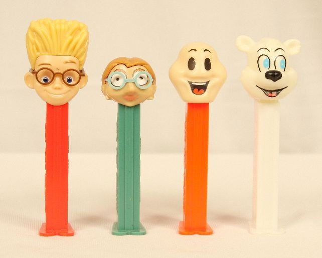 Lot of 4 Misc. PEZ Dispensers ED948: Lot of 4 Misc. PEZ Dispensers ED948. As-Is Condition! FY4XM. Lot of 4 miscellaneous PEZ dispensers. Included is one 4.9 Ghost", 4.9 "Winter Bear", 4.9 "Irma Gobb" from Mr. Bean, and 5.9 "Lewis" from M