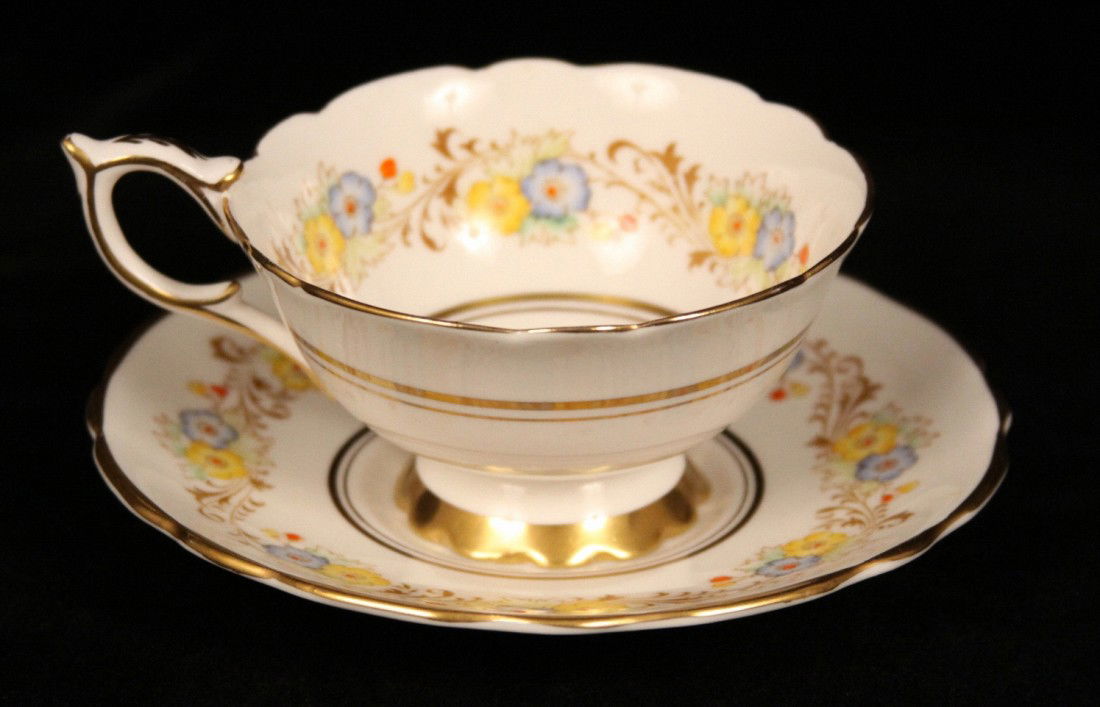 Royal Stafford China Lovely Blue and Yellow Flowers wit: Royal Stafford China Lovely Blue and Yellow Flowers with Gold Accent BD165. Excellent Vintage Condition! BK13LU. This elegant bone china from Royal Stafford tea cup and saucer set has a lovely design