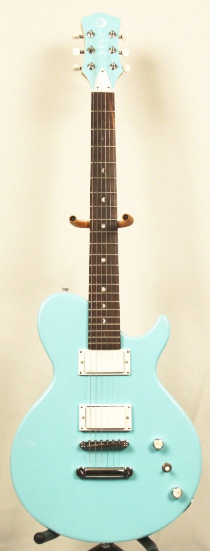 Luna 6-String Sea Foam Colored Les Paul GUI34: Luna 6-String Sea Foam Colored Les Paul GUI34. New Condition! MU942ES. Luna 6-string sea foam colored Les Paul. New store Demo with 2 noiseless humbucking pickups. Thank you for viewing this lot! We a