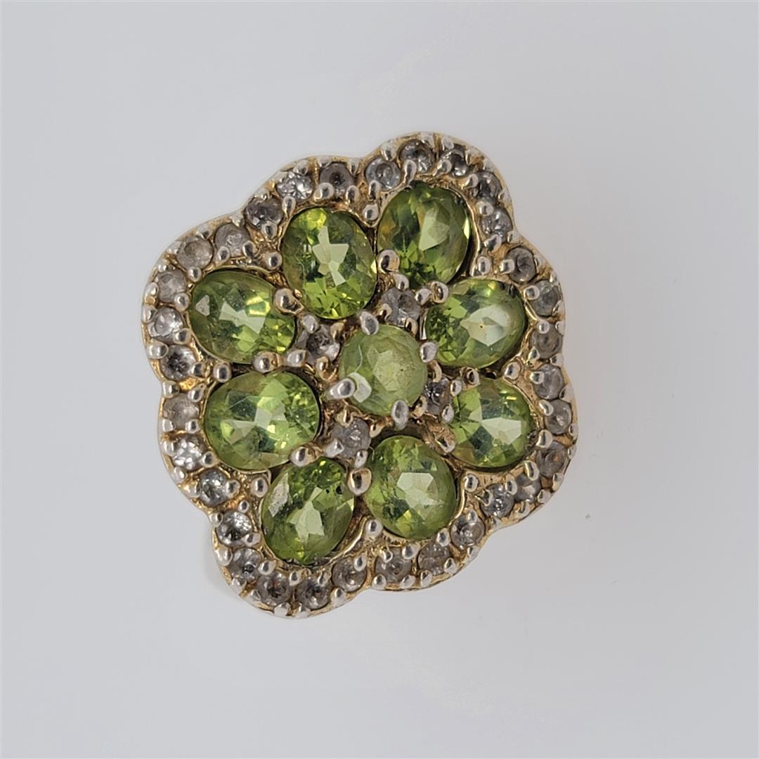 Sterling Silver Ring: One Sterling Silver Ring. The ring size is 8.25. Contains semiprecious stones.