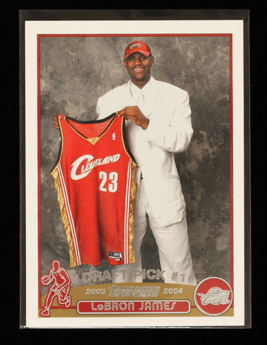 2003 Topps LeBron James Rookie Card C261: "2003 Topps LeBron James Rookie Card C261. As-Is Condition! PK83UN. One 2003 Topps LeBron James Rookie Card #221. Team: Cleveland Cavaliers. Thank you for viewing this lot. We are always adding new in
