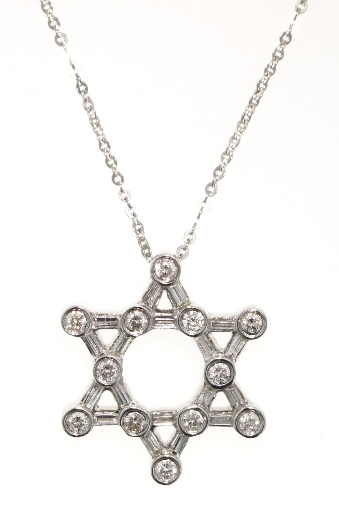 18KT White Gold 0.85ct Diamond Star of David Necklace: "18KT White Gold 0.85ct Diamond Star of David Necklace. Excellent Condition! JH224ZX. 18KT white gold and diamond Star of David necklace featuring 30 baguette and round diamonds weighing a total of 0.