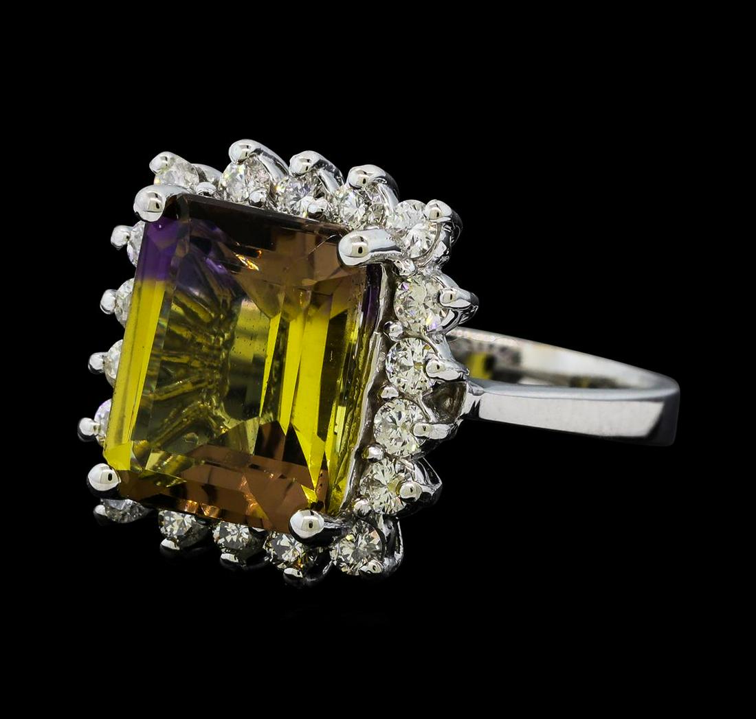 4.62 ctw Ametrine Quartz and Diamond Ring - 14KT White Gold: One Ametrine Quartz and Diamond Ring including: 14KT White Gold weighing a total of 5.50 grams, Ametrine Quartz weighing a total of 4.62ct and 18 Diamonds weighing a total of 0.65ctw.