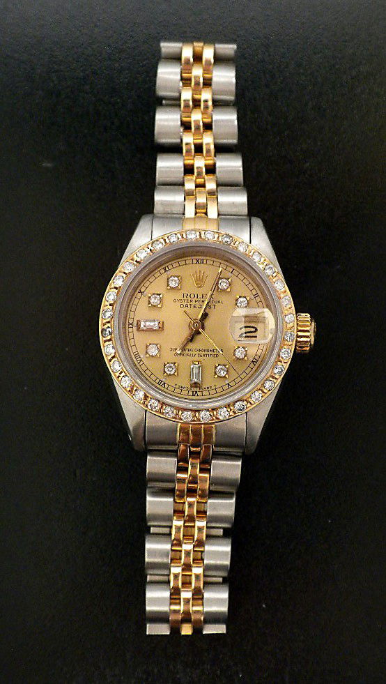 Lady Rolex Two-Tone DateJust Wristwatch A3357: Lady Rolex Two-Tone DateJust Wristwatch A3357. Great Condition! GT8681FE. One ladies, hand crafted and machine milled Rolex DateJust Model Stainless Steel and 18KT yellow gold wristwatch electronicall