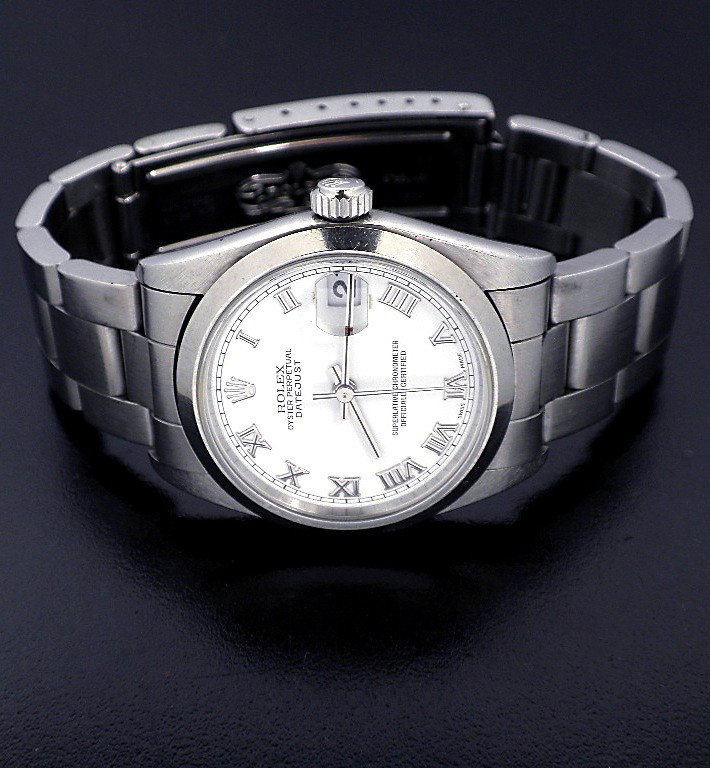 Rolex Mid Size DateJust Stainless Steel Wristwatch WBS9: Rolex Mid Size DateJust Stainless Steel Wristwatch WBS90. Great Condition! PK1023FT. One, hand crafted and machine milled Rolex Mid Size DateJust wristwatch electronically tested stinless steel. Case: