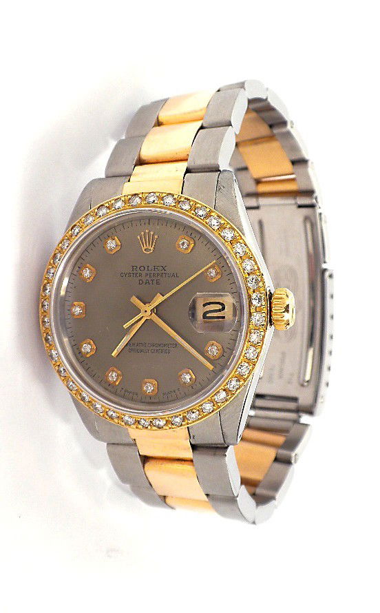 Gents Rolex Two-Tone Date Model Wristwatch A3386: "Gents Rolex Two-Tone Date Model Wristwatch A3386. Great Condition! RE1852SM. One gents, hand crafted and machine milled Rolex Date Model wristwatch electronically tested 14KT yellow gold and stainles