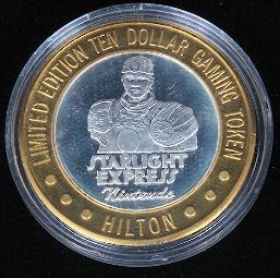 Limited Edition $10 Gaming Token from the Hilton Starli: "Limited Edition $10 Gaming Token from the Hilton Starlight Express Nintendo Las Vegas, Nevada GT60. This Gaming Token is listed in AS-IS condition. PT01YH Limited Edition $10 Gaming Token from the Hi