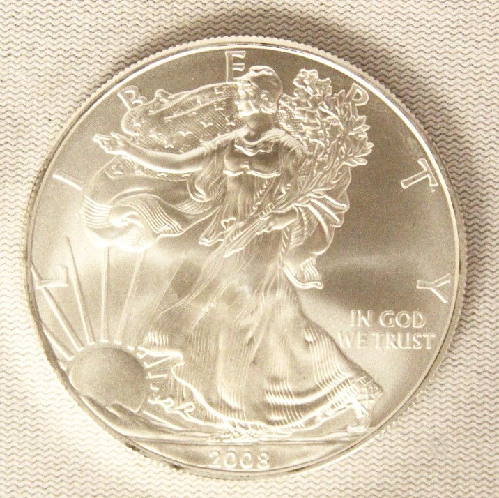 2008 American Silver Eagle COMS136: "2008 American Silver Eagle COMS136. As-Is Condition! IN14TR. 2008 American Silver Eagle. 1 oz. fine silver. Thank you for viewing this lot. We are always adding new inventory and new auctions, so che
