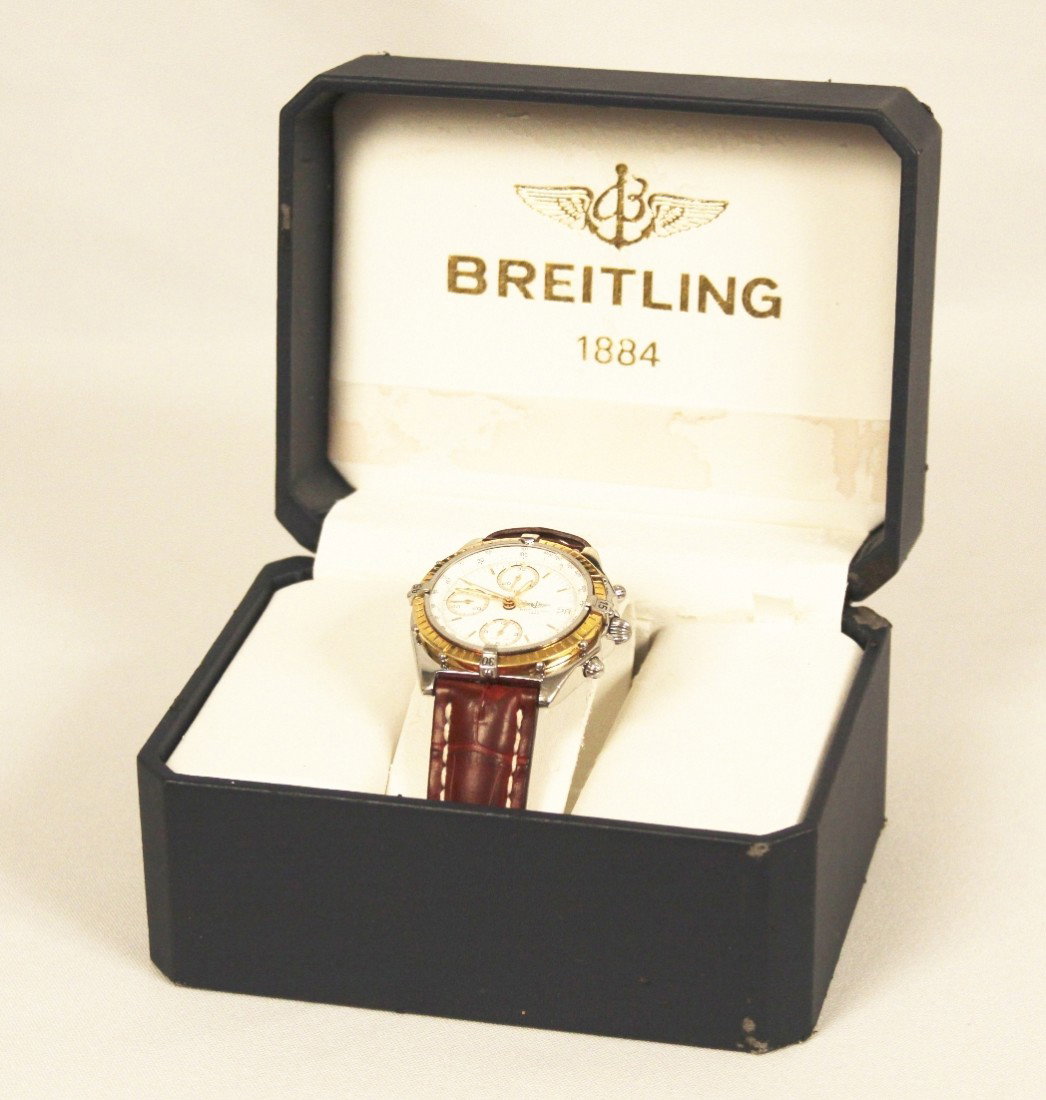 Breitling Two Tone Chronomat Wristwatch BD337: "Breitling Two Tone Chronomat Wristwatch BD337. Great Condition! NT1051WR. One gents, Breitling Chronomat wristwatch electronically tested Stainless Steel. Case: 40mm diameter. Bezel: 18KT yellow gold