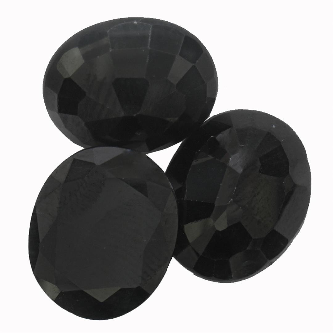 16.52 ctw Oval Cut Sapphire Parcel: Three oval cut sapphires, measuring 12.00 x 10.00mm, approximate total weight of 16.52ct., clarity is heavily included to severely included, very dark blue color. Indications of multiple laboratory en
