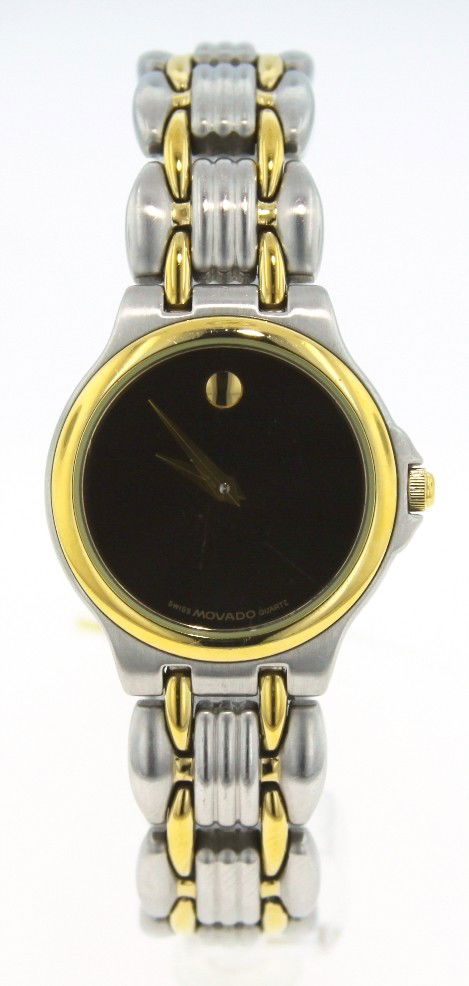 Genuine Two Tone Movado Watch RM61: "Genuine Two Tone Movado Watch RM61. Fine Condition! BG431ER. This is a genuine two tone Movado Watch. Light scratches on the face. All stainless steel. Quartz. Weighs 51.5gms. Thank you for viewing t