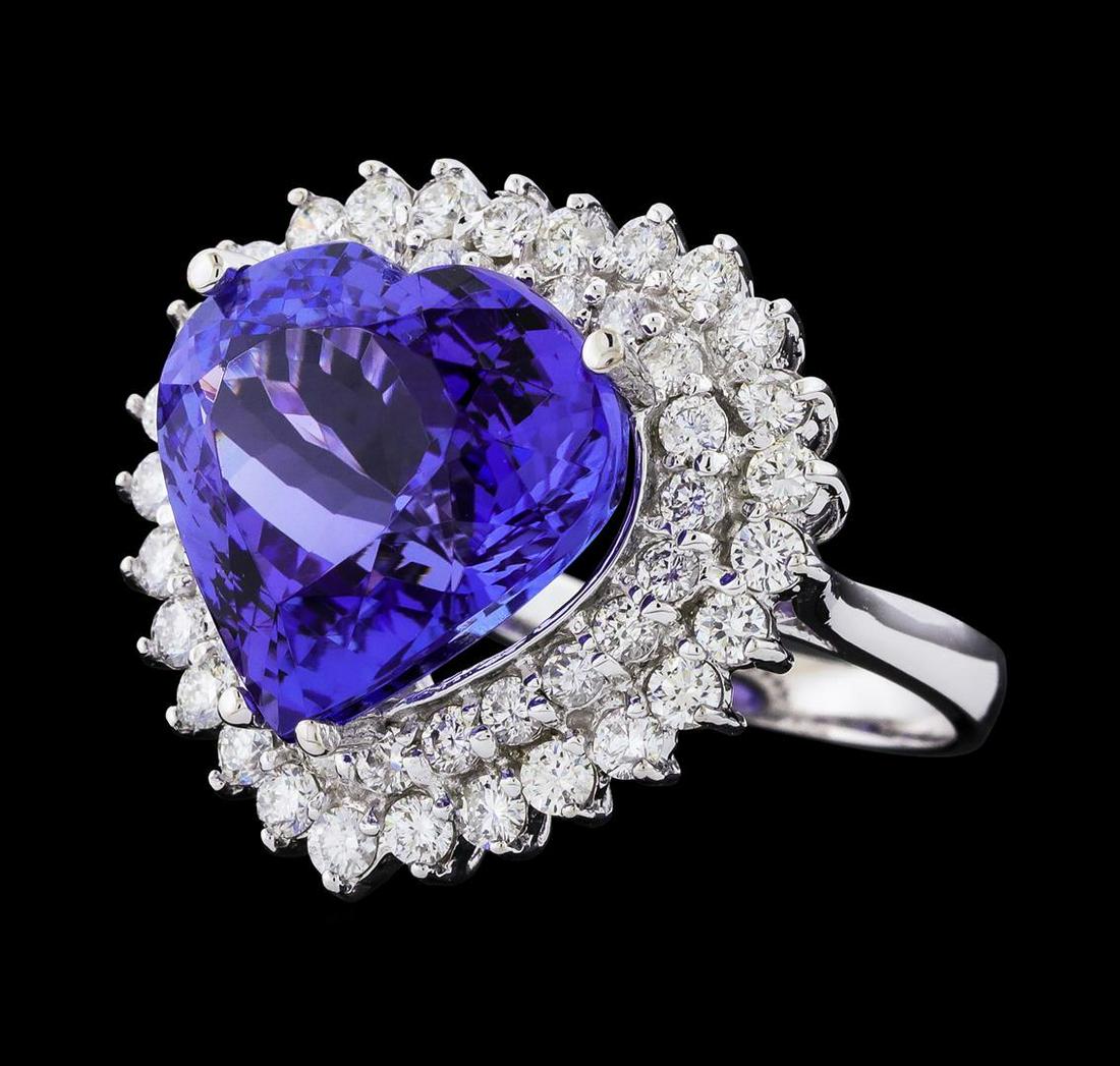 GIA Cert 12.12 ctw Tanzanite and Diamond Ring - 14KT White Gold: One electronically tested 14KT white gold lady's cast fashion heart shape ring with a double basket halo with a bright polish finish. The featured lady's ring has a shank measuring 2.38 millimeters wi