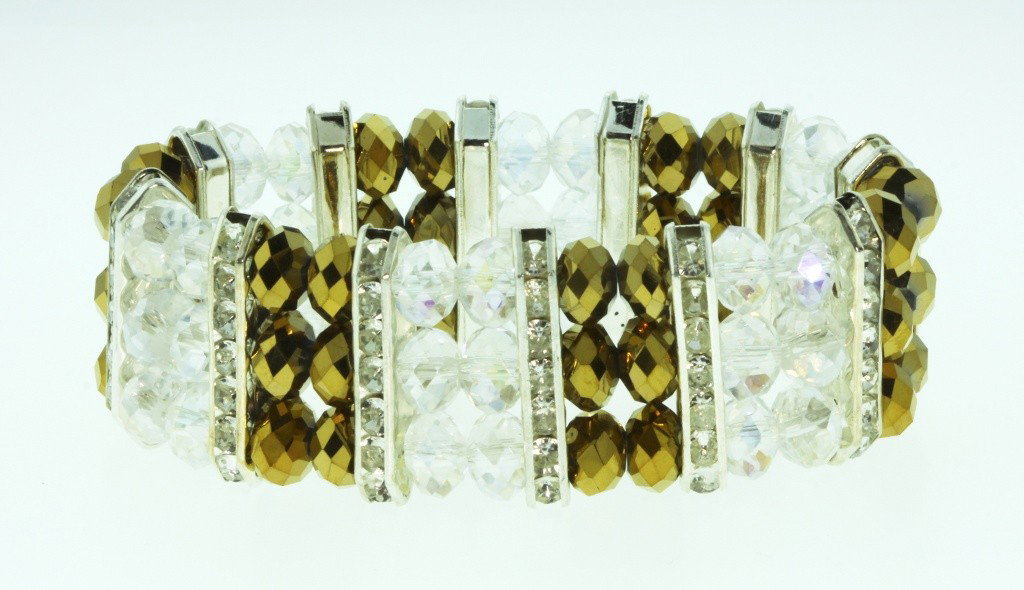 Gold Crystal Bracelet CN147: "Gold Crystal Bracelet CN147. Excellent Condition! XG3GT. One stunning gold crystal fashion bracelet with an elastic band to conform to any size wrist. Accented with rhinestones and colored crystal be