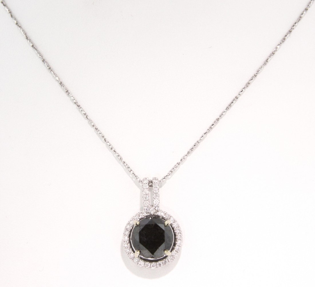 14KT White Gold 6.26ct Black and White Diamond Pendant : "14KT White Gold 6.26ct Black and White Diamond Pendant with Chain RM142. Excellent Condition! CH9341DU. One electronically tested 14KT white gold laides cast and assembled black and white diamond pen