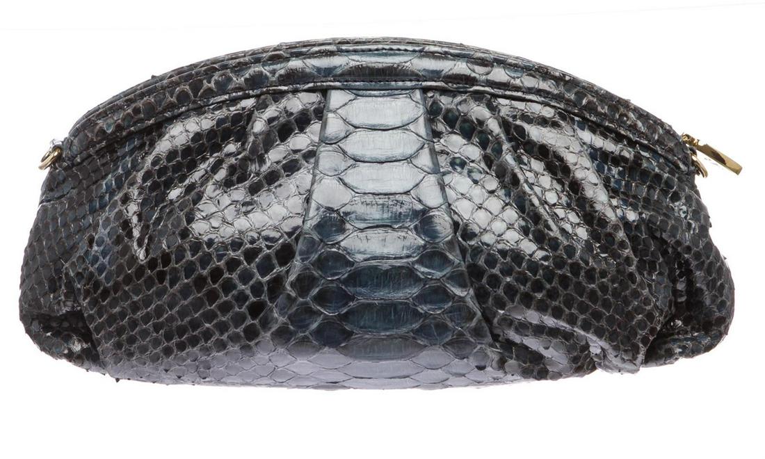 MCM Navy Blue Python Snakeskin Clutch Bag: MCM Navy Blue Python Snakeskin Clutch Bag. Please see photos and description for all available information! MCM Navy Blue Python Snakeskin Clutch Bag with snakeskin, silver tone hardware, one slip poc