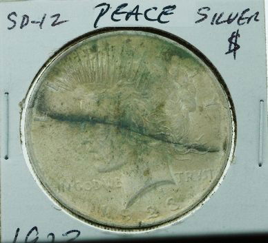 1923 Peace Silver Dollar SD12: "1923 Peace Silver Dollar SD12. As-Is Condition - Thank you for viewing this lot. We are always adding new inventory and new auctions, so check back often. We appreciate your business and support! Enj