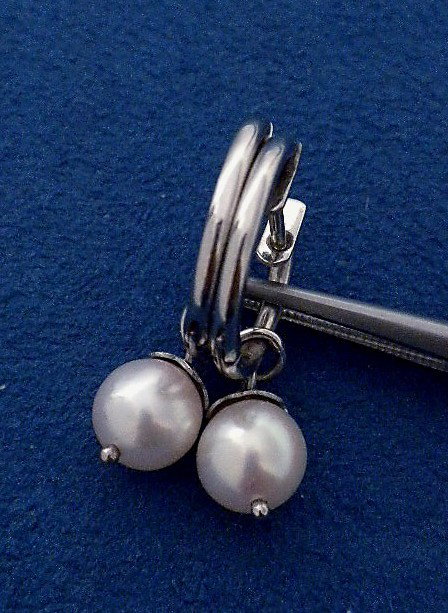 14KT White Gold Akoya Cultured Pearl Dangle Earrings WB: "14KT White Gold Akoya Cultured Pearl Dangle Earrings WBS83. Good Condition! LX16CF. One pair electronically tested 14KT white gold ladies cast and assembled Akoya cultured pearl dangle style earrings