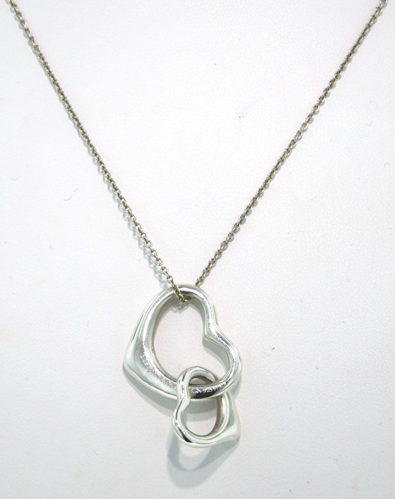 Tiffany and Co Elsa Peretti Sterling Silver Dbl Heart N: "Tiffany and Co Elsa Peretti Sterling Silver Dbl Heart Necklace WBS110. Great Condition! RA681HR. This is a beautiful and unique double floating heart pendant necklace from the renowned American jewel