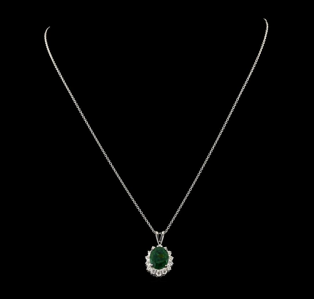 4.35 ctw Emerald and Diamond Pendant With Chain - 14KT White Gold: One electronically tested 14KT white gold lady's cast fashion pendant & chain 18.0' long, 1.25mm round cable link with a lobster claw clasp with a basket halo with a bright polish finish. The featured