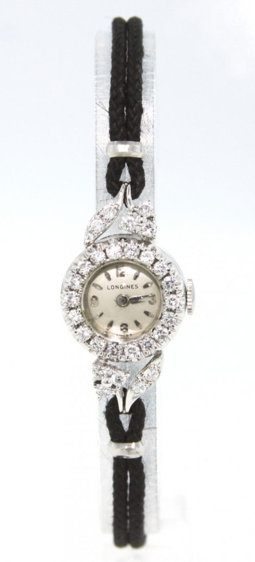 Ladies Vintage Longines Diamond Wristwatch A3501: "Ladies Vintage Longines Diamond Wristwatch A3501. Good Condition! JI835NT. One ladies, cast and assembled Vintage Longines wristwatch electronically tested 14KT white gold. Bezel: diamond. Crystal: a
