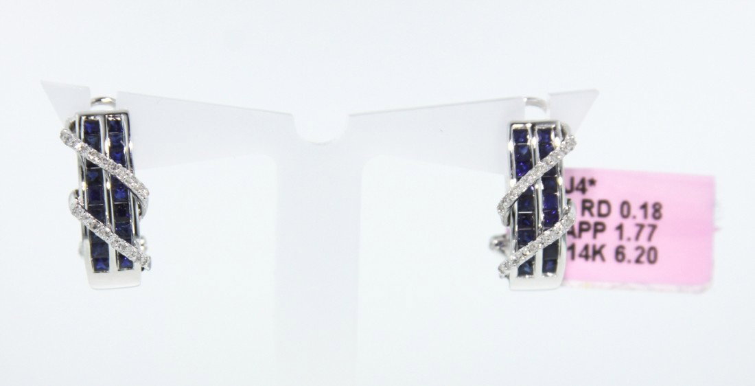 14KT White Gold 1.77ct Sapphire and Diamond Earrings FJ: 14KT White Gold 1.77ct Sapphire and Diamond Earrings FJM583. Excellent Condition! NS934EH. One pair of 14KT white gold sapphire and diamond earrings with a French clip back. The pair of earrings featu
