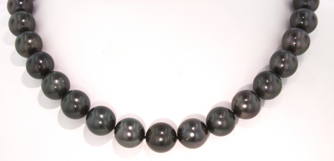 Tahitian Cultured Pearl Necklace RM177: "Tahitian Cultured Pearl Necklace RM177. Great Condition! PV859NI. One graduated single strand pearl necklace seventeen and one half inch princess length, knotted with an 14KT white gold ten mimllimet
