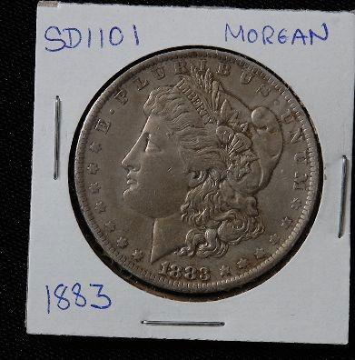 1883 Morgan Silver Dollar SD1101: 1883 Morgan Silver Dollar SD1101 - AE12TD - Thank you for bidding on this item. We appreciate your business. Be sure to check out all of the upcoming auctions offered by Seized Assets Auctioneers!