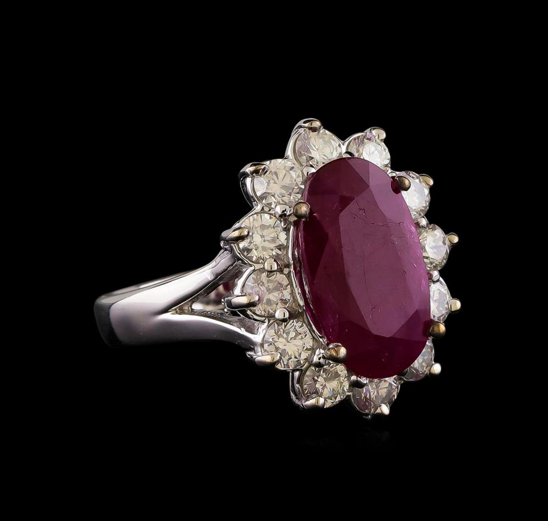 GIA Cert 4.09 ctw Ruby and Diamond Ring - 14KT White Gold: One electronically tested 14KT white gold lady's cast fashion ring with a basket halo with a bright polish finish. The featured lady's ring has a shank measuring 2.90 millimeters wide. Identified with