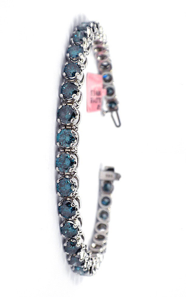 14KT White Gold 11.95ct Blue Diamond Tennis Bracelet FJ: "14KT White Gold 11.95ct Blue Diamond Tennis Bracelet FJM696. New Condition! QN8744KI. One electronically tested 14KT white gold ladies cast and assembled diamond tennis bracelet with a bright polish 