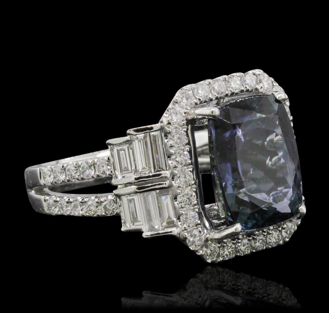 18KT White Gold 4.68 ctw Tanzanite and Diamond Ring: One electronically tested 18KT white gold ladies combination cast & assembled tanzanite and diamond ring with a split shank with a bright polish finish. Identified with markings of "750". Condition is