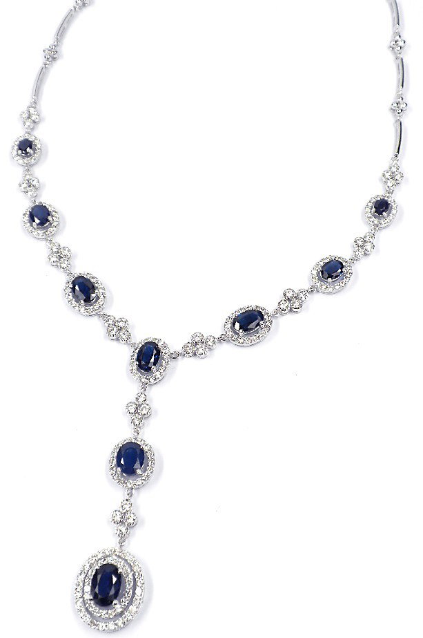 14KT White Gold 5.41ct Sapphire and Diamond Necklace FJ: 14KT White Gold 5.41ct Sapphire and Diamond Necklace FJM596. New Condition! ZF1422SI. One electronically tested 14KT white gold ladies cast and assembled sapphire and diamond lariat style necklace wit
