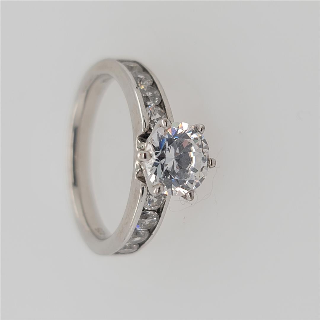 Sterling Silver Ring: One Sterling Silver Ring. The ring size is 7. Contains semiprecious stones.