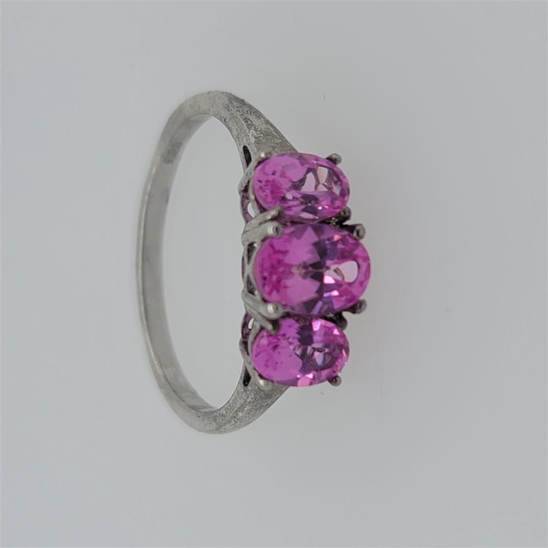 Sterling Silver Ring: One Sterling Silver Ring. The ring size is 8.25. Contains semiprecious stones.